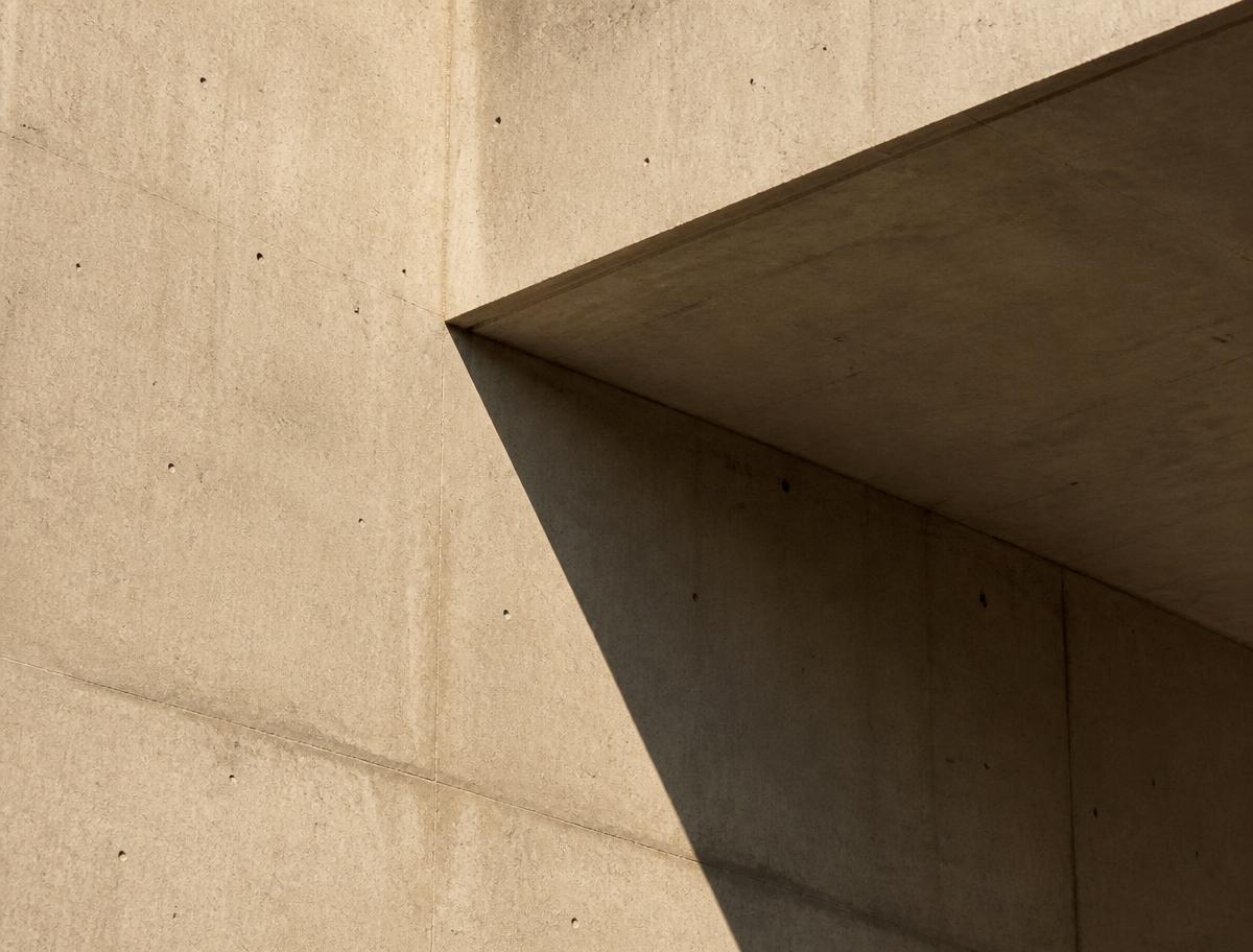 Architectural concrete detail with hard-edged shadow